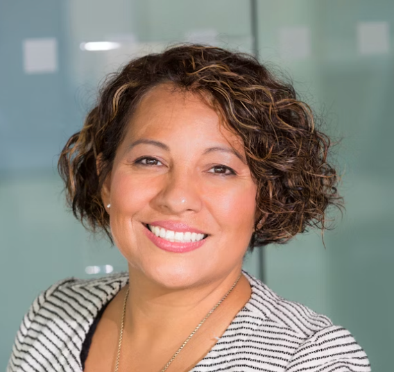 Smiling woman in striped shirt