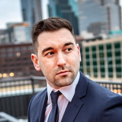 Businessman portrait with city background